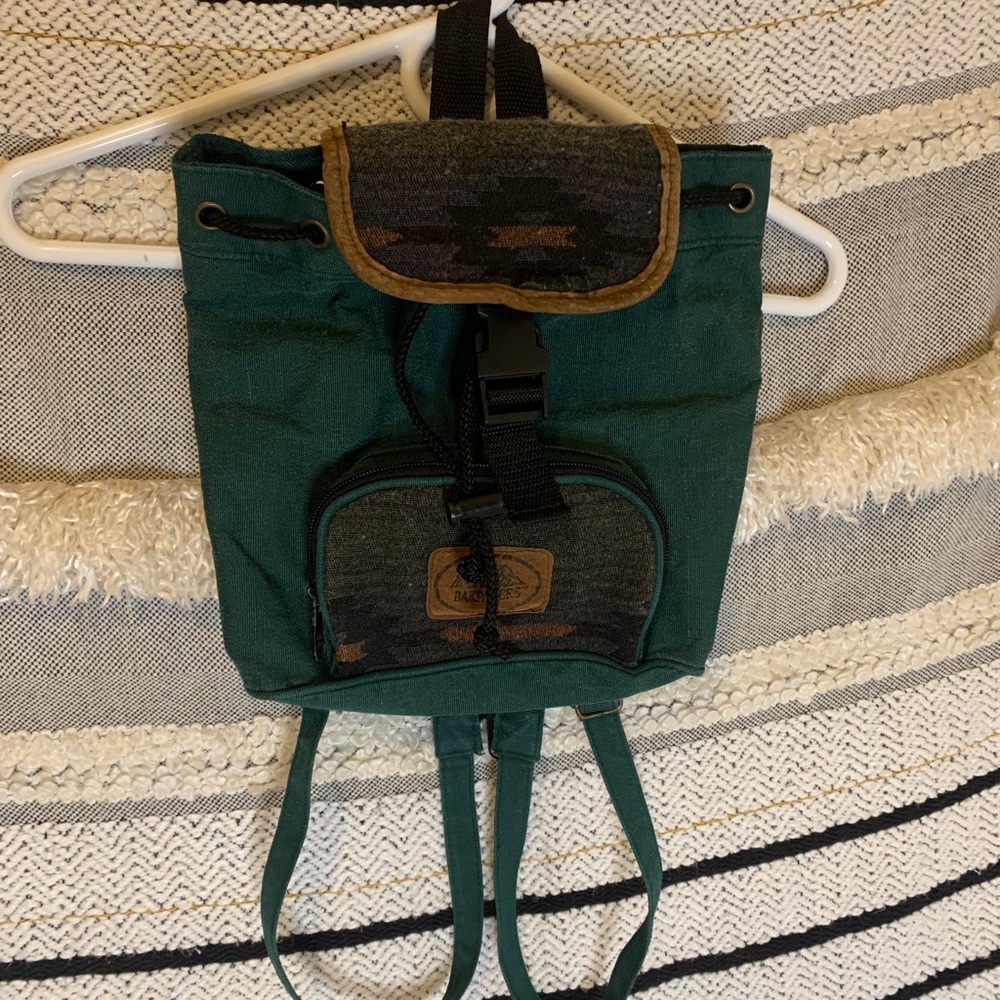Dark green mini bucket backpack
